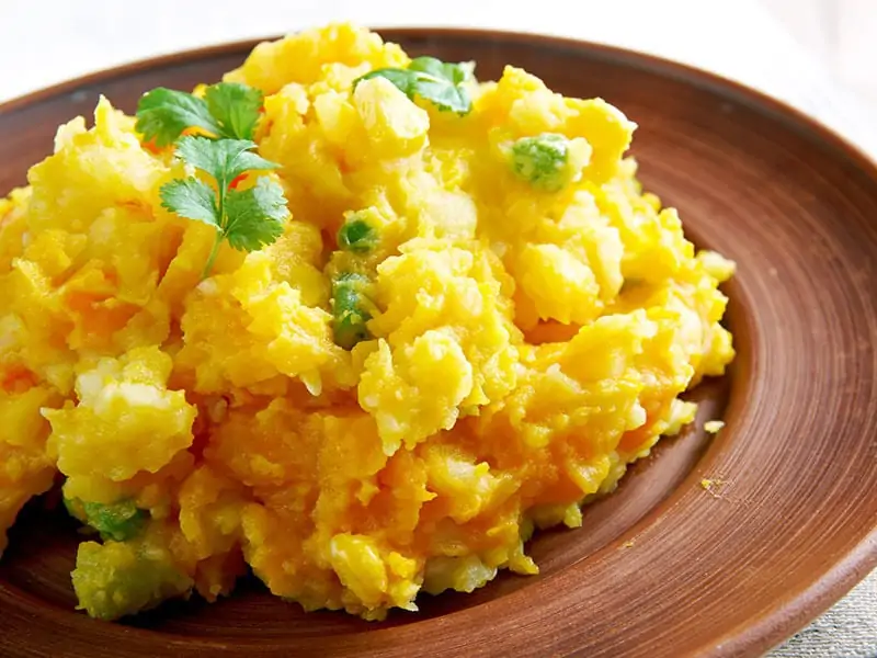 Mashed potatoes and peas with corn Irio